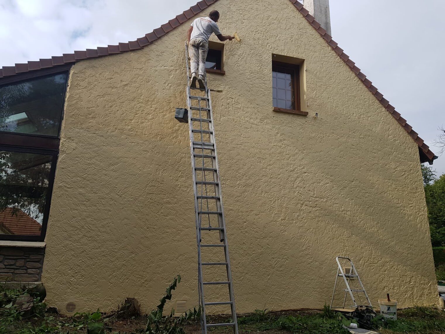 Application de peinture de façade